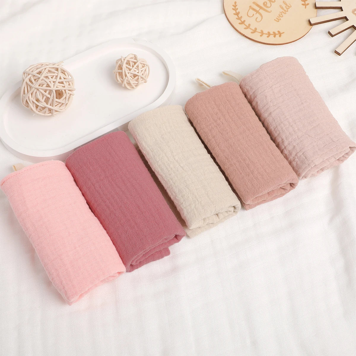 1. “Stack of 6-layer organic cotton baby washcloths in neutral colors”
2. “Soft and absorbent eco-friendly baby washcloths set”
3. “Close-up of breathable 100% cotton fabric texture”
4. “Baby towel used as a burp cloth on a newborn’s shoulder”
5. “Folded pure cotton baby wipes laid on a clean surface”