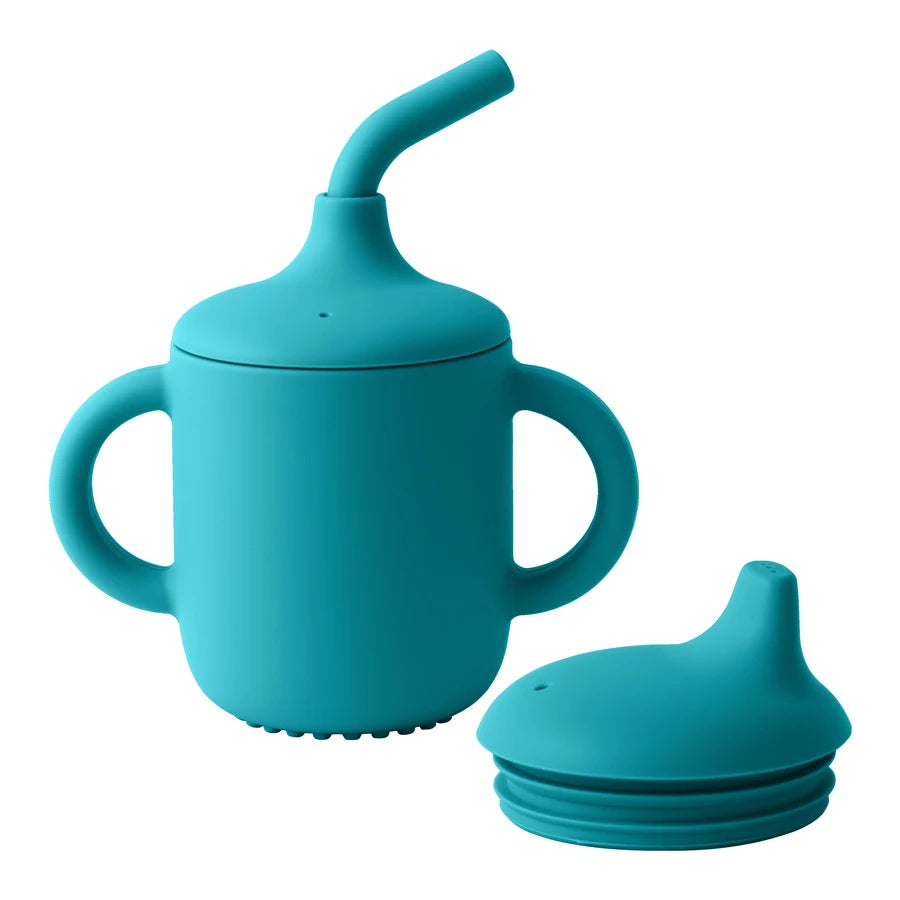 Turquoise sippy cup with straw and additional lid on a white background