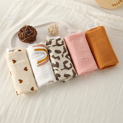 	1.	“Stack of 6-layer organic cotton baby washcloths in neutral colors”
	2.	“Soft and absorbent eco-friendly baby washcloths set”
	3.	“Close-up of breathable 100% cotton fabric texture”
	4.	“Baby towel used as a burp cloth on a newborn’s shoulder”
	5.	“Folded pure cotton baby wipes laid on a clean surface”