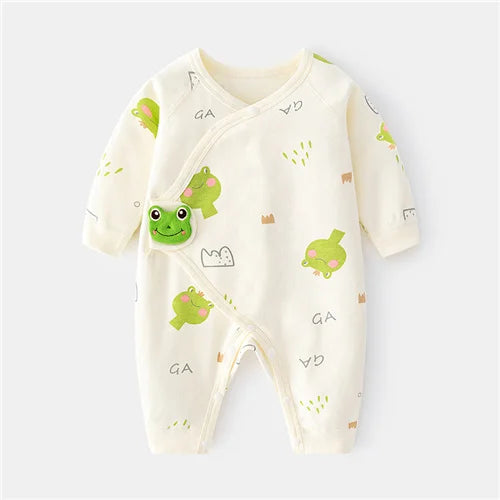 Baby onesie with frog design on a white background