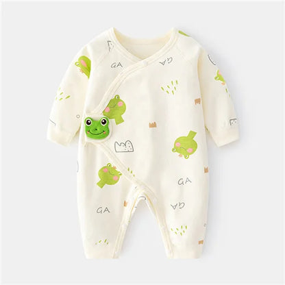 Baby onesie with frog design on a white background